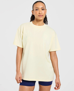 Camiseta de Manga Corta para Mujer, Cuello Redondo, Color Amarillo Pálido, Talla Grande, Corte Holgado, Color Sólido, Transpirable, de Algodón Jersey, para Primavera/Verano - Product Image 1
