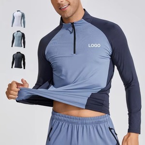 Chemise de performance pour homme à manches longues, col montant, blocs de couleur blanc et bleu, fermeture éclair quart de tour, anti-humidité, coupe ajustée, vêtement de sport - Product Image 3