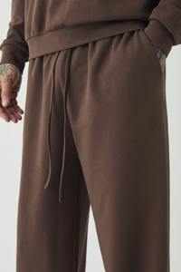 Nouvel article : Pantalon de survêtement marron pour homme, coupe large, taille élastique, décontracté, pour l'automne, 100 % coton, respirant, poids moyen, avec cordon de serrage - Product Image 6
