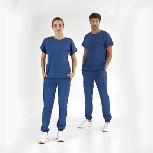 Ensemble de tenues médicales personnalisées avec logo pour clinique dermatologique : pantalon unisexe extensible, respirant, anti-aiguille et ajusté pour le personnel médical - Product Image 1