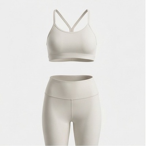 Conjunto de yoga sin costuras para mujer, 2 piezas, sujetador deportivo con tiras cruzadas, leggings de cintura alta - Product Image 1