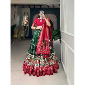PATOLE EN SOIE FANCY TUSSAR AVEC IMPRIMÉ EN FEUILLE TRAVAIL LEHENGA CHOLI AVEC DUPATTA VERT - Product Image 1