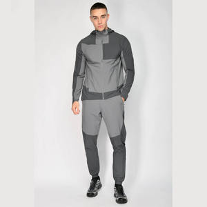 Ensemble deux pièces streetwear coupe-vent en nylon : veste zippée et pantalon, personnalisable pour la vente en gros - Product Image 1