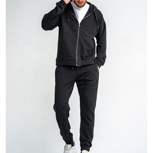 Conjunto Deportivo Unisex Negro Reflectante de 2 Piezas, Chaqueta con Cremallera y Pantalones de Nailon para Gimnasio y Deporte - Product Image 1