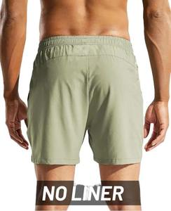 Shorts de performance pour hommes à séchage rapide, en tissu perforé découpé au laser, avec cordon de serrage, pour la gym, la course et l'entraînement, couleur unie, été - Product Image 2