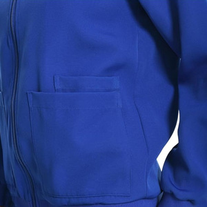 Blouse médicale bleue pour femme en polyester et nylon tricoté micro-extensible, ensemble uniforme d'hôpital avec poches zippées et détection d'aiguilles - Product Image 4