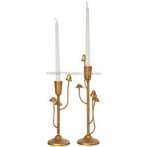 Elegante candelabro alto de latón con detalles artísticos diseñado para acentos de hogar vintage y celebraciones festivas - Product Image 1