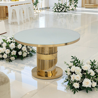 Table de banquet moderne en verre trempé rond avec plateau en acier inoxydable et chaises pour la réception de mariage et l'utilisation en salle à manger d'hôtel