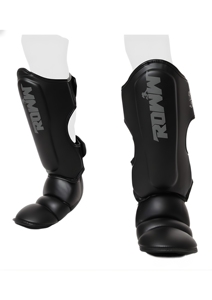 Protections de tibia personnalisées pour sports de combat avec rembourrage moulé par injection EVA multicouche pour la protection des jambes en MMA, Muay Thai, Kickboxing - Product Image 1