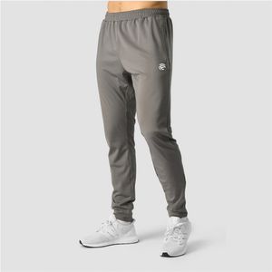 Pantalones deportivos color carbón diseñados para el gimnasio y con tela elástica de poliéster y elastano con paneles de malla para ventilación. - Product Image 1