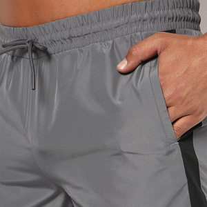 Shorts Bermuda Gris Uni à Séchage Rapide pour Homme, Taille Mi-Haute avec Cordon de Serrage, Bande Latérale et Logo Avant, Style Sportif, Tissu Polyester - Product Image 5