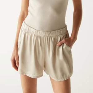 Women's Loose Fit Cotton Oxford Shorts Solid Color <b>Elastic</b> Waist Casual Mid Rise Breathable Woven Fabric Short <b>Skirts</b> - Product Image 1