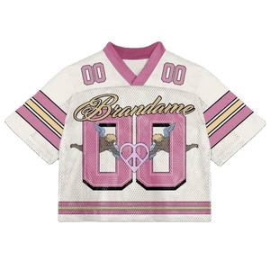 Camiseta de fútbol americano OEM con hombros caídos, cuello en V de malla, estilo urbano holgado, uniforme personalizado con panel de rayas rosas por sublimación - Product Image 1