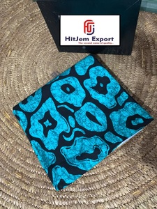 Motif africain imprimé sur tissu ciré reflétant les couleurs audacieuses du Kente ghanéen et l'expression culturelle moderne - Product Image 2