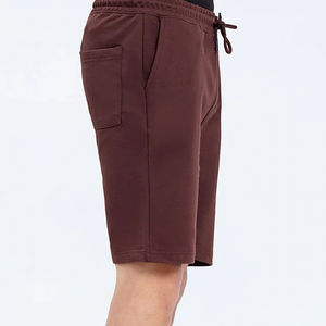 Pantalones cortos para hombre de color sólido, extragrandes, con bolsillos laterales y cordón interior, con logo impreso en DTF personalizado y diseño único. - Product Image 5