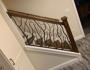 <b>Wall</b>-mounted wrought iron stair railing featuring a leaf pattern; rust-resistant, easy to assemble, and contemporary in style. - Product Image 2
