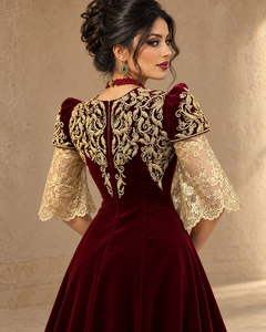 Gandoura algérienne longue en velours brodé or bordeaux Mishkat Couture avec manches cloche en dentelle, ceinture dorée et voile assorti pour femme - Product Image 1
