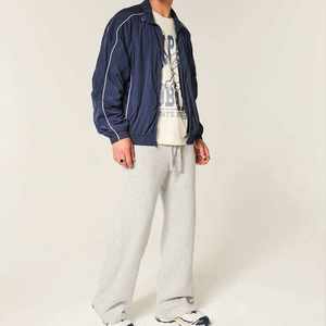 เสื้อแจ็คเก็ตกันลมผู้ชายแบบมีซิป สั่งทำโลโก้ได้ ผลิตจากไนลอนและโพลีเอสเตอร์ เหมาะสำหรับวิ่งและเล่นกีฬา ขายส่งจำนวนมาก - Product Image 4