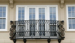 Traditional wrought iron balcony railing featuring intricate patterns and a rust-resistant coating, suitable for outdoor use. - Product Image 6