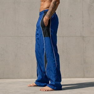 Pantalon de survêtement bleu pour homme avec bande latérale, taille élastique, séchage rapide, léger, décontracté, en polyester, pour l'été - Product Image 4