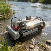 Robot de dragage de canalisations, chenillard subaquatique, machine de nettoyage de boues pour le désobstruction des conduites d'égouts