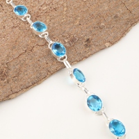 Bracelet ajustable en argent 925 fait main avec topaze bleue suisse ovale facettée et sertie de laiton, bijou statement