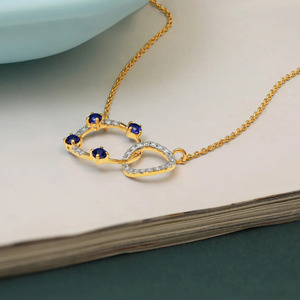 Interlocking Blue Stone <b>Circle</b> Diamond Necklace with Dual <b>Ring</b> Sparkle and Modern Geometric Design - Product Image 3