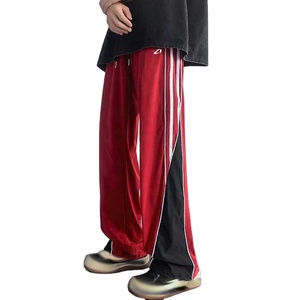 กางเกงวอร์มไนลอนกันลมสีสันตัดกันสำหรับผู้ชาย สไตล์ลำลองสตรีทแวร์ ขากว้าง เอวยางยืด น้ำหนักเบา จัดส่งตรงจากโรงงาน - Product Image 1
