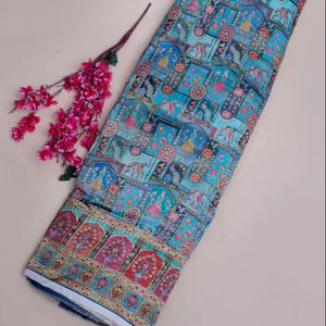 Tela de viscosa pura jacquard azul cielo con estampado étnico y borde ornamental para material de vestido Kurti de diseñador. - Product Image 1