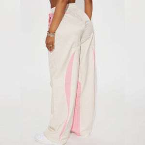 Pantalones de chándal holgados blancos de poliéster con cordón y logotipo personalizado para mujer, cortavientos de nailon, pantalones tipo paracaídas personalizados - Product Image 2