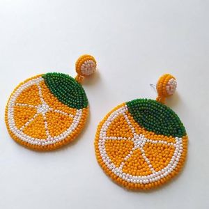 Boucles d'oreilles artisanales en forme de tranches d'orange perlées, bijoux ronds en coton, broderie artisanale - Product Image 1