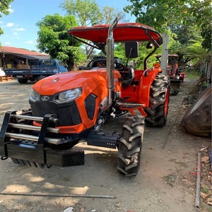 Tracteur Kubota L5018, machine agricole miniature fiable pour l'agriculture, l'aménagement paysager, la tonte, le chargement et le déneigement. - Product Image 4