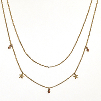 Collier double rangs empilable polyvalent Gemnel avec mini-breloques étoile de mer en zircon cubique pour un style superposé