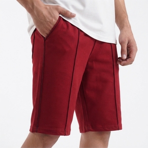 Pantalones Cortos Deportivos Casuales Elásticos y Transpirables de Moda con Cintura Media Elástica en Color Sólido - Product Image 1
