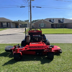 รถตัดหญ้าแบบยืนขับเคลื่อนด้วยเครื่องยนต์เบนซิน 2 จังหวะ ยี่ห้อ Gravely รุ่นใหม่ สำหรับงานหนัก โครงสร้างอะลูมิเนียม สำหรับมืออาชีพ - Product Image 1