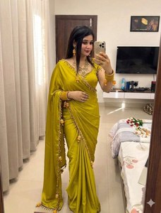 Sari en soie pure Rangoli, style Jumka, avec dentelle et broderie de perles traditionnelles, élégant, avec chemisier en satin, pour femme, vert pistache, idéal pour les fêtes. - Product Image 1