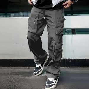 Pantalon cargo ample et uni pour homme, taille élastique, plusieurs poches, décontracté, respirant, en toile mi-lourde, pour l'automne - Product Image 1