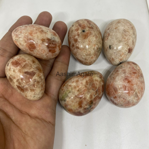 Œuf de cristal de pierre de soleil naturelle poli, pierre précieuse de guérison pour le Reiki, la méditation, les chakras et la décoration intérieure - Vente en gros - Product Image 5