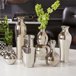 Vase à fleurs en métal complexe, doté d'un travail de précision, idéal pour sublimer les arrangements de table et les intérieurs. - Product Image 5
