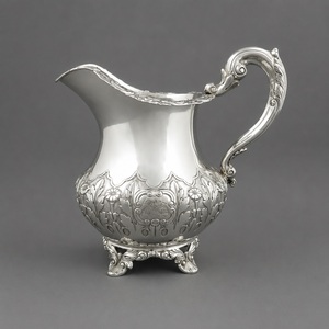 Vintage Metal Pitcher With Ornate Handle And Scroll Feet For <b>Tea</b> - Product Image 1