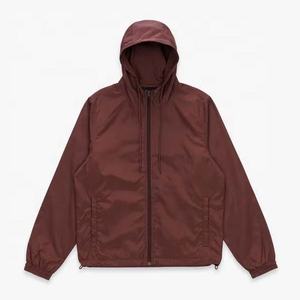 2025 veste en nylon coupe-vent à capuche légère de jogging pour hommes personnalisés avec tissu en polyester imperméable - Product Image 1