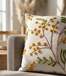 Housse de coussin florale texturée artisanale avec motif de feuilles vertes et de fleurs jaunes complexes - Product Image 4