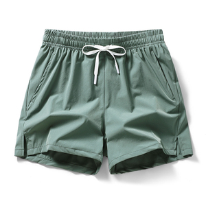 Shorts de plage pour hommes 100 % polyester, taille élastique unie, coupe ample, décontractés, séchage rapide, écologiques, pour le surf et les sports d'été - Product Image 1