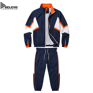 Ensemble coupe-vent deux pièces personnalisé pour hommes, veste coupe-vent et pantalon de jogging bicolore marine, orange et blanc - Product Image 1