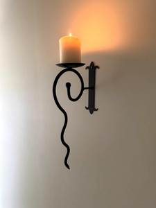 Ornate Wall <b>Sconce</b> that blends vintage European-inspired styling with functional <b>candle</b> lighting - Product Image 1