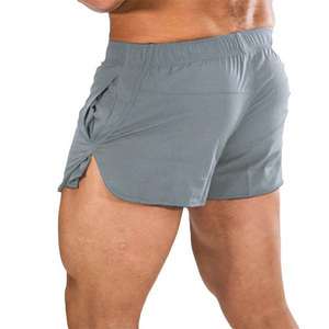 Shorts de sport gris uni coupe-vent à séchage rapide pour homme avec poches, taille élastique, longueur mi-cuisse, en toile de coton - Product Image 2
