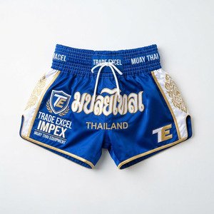 กางเกงมวยไทยคุณภาพสูงขายดีที่สุด ผลิตตามสั่ง ขายส่ง สำหรับผู้ใหญ่ทุกเพศ ชุดศิลปะการต่อสู้ OEM น้ำหนักเบา โพลีเอสเตอร์ 100% - Product Image 1