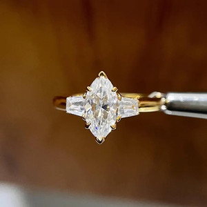 Elegant Marquise Cut Lab Grown Diamond Engagement <b>Ring</b> In Yellow Gold With Tapered Side Stones And Bridal Style - Product Image 1