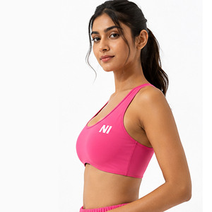 Women's Pink Racerback Sports Bra Scoop Neck Medium Support Breathable Seamless Fitness Top Solid Color Front Logo - Product Image 5