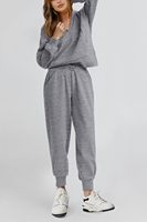 Ensemble de survêtement gris côtelé pour femme avec sweat-shirt demi-zip et pantalon long coupe droite, idéal pour l'automne, avec poches latérales et logo frontal